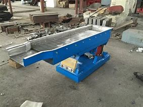 Image result for Vibration Tray Feeder