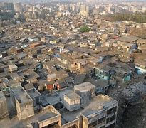 Image result for Ambani House in Mumbai with Slums in Background
