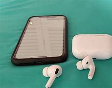 Image result for iPhone XR and AirPods