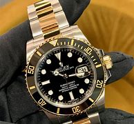 Image result for Gold Rolex Submariner Watch