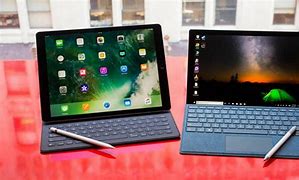 Image result for Surface Pro 9 vs iPad Pro in Size
