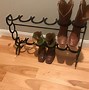 Image result for Horseshoe Cowboy Boot Rack