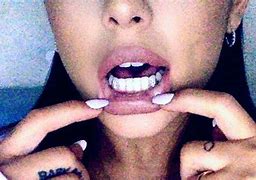 Image result for Ariana Grande Diamond Teeth