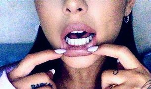 Image result for Ariana Grande Grillz Teeth