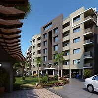 Image result for Apartment Exterior with Store