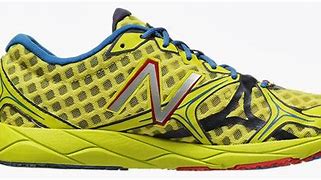 Image result for New Balance Baseball Cleats