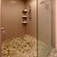 Image result for Pebble Mosaic Tile Floor Shower Designs