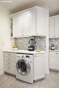 Image result for Hidden Laundry in Kitchen Design Ideas