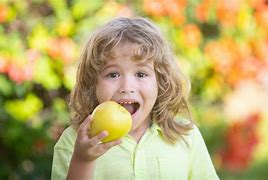 Image result for Toothless Kid Eating an Apple