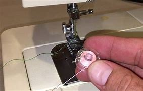 Image result for How to Thread A Poolin Sewing Machine