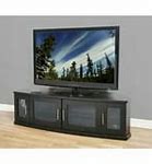 Image result for Flat Screen TV Cabinet with Folding Doors