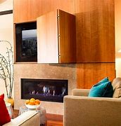 Image result for Hidden TV above Fireplace