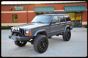 Image result for Jacked Up Jeep Cherokee