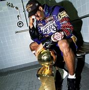 Image result for Kobe Bryant with NBA Championship Trophy