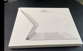 Image result for iPad Pro Silver with White Magic Keyboard