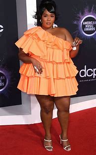 Image result for Photo of Lizzo Wearing Trash Bag Dress