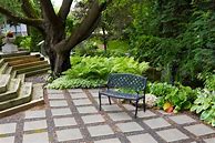 Image result for Concrete Stepping Stones in Wood Frame