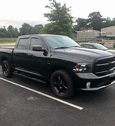 Image result for Blacked Out White 209 Ram 1500