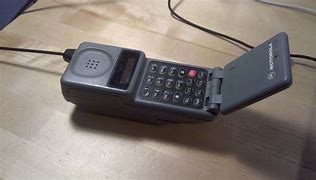 Image result for Vintage Grey Motorola Flip Phone