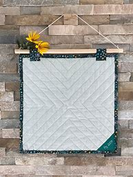 Image result for How to Hang Quilt On Wall