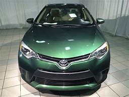 Image result for Toyota Corolla Green 4-Doors