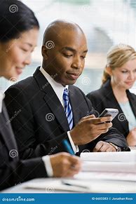 Image result for Texting On Cell Phone at Work