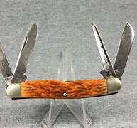 Image result for 4 Bladed Knife