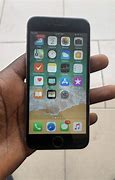 Image result for Nigerian Holdings iPhone