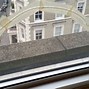 Image result for Broken Window On a Nice House