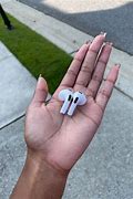 Image result for mac airpods third gen with lightning charger cases