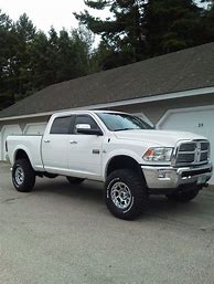 Image result for Ram 1500 with 4 Inch Lift with 35 Inch Toyo Tires