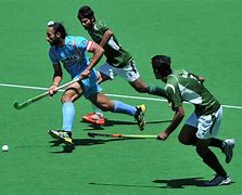 Image result for Hockey Playing Pic in Pakistan