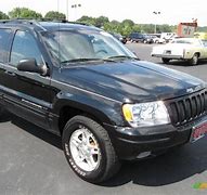 Image result for 2000 Black Jeep Cherokee
