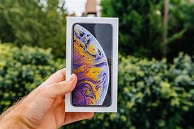 Image result for Holding iPhone XS Max