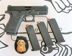 Image result for FBI Agent with Gun