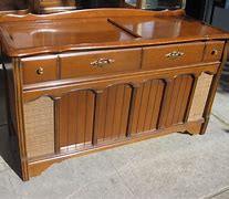 Image result for Vintage Magnavox Console with Roll Back Drawers