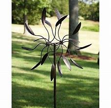 Image result for Metal Spinning Yard Decorations