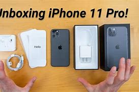 Image result for iPhone 11 Pro Box Next to the Apple Logo