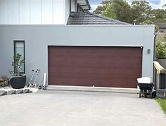Image result for Sectional Garage Doors