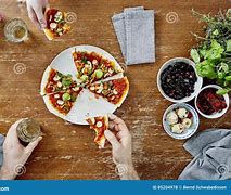 Image result for Two People Eating Pizza