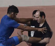 Image result for Indian Wrestling Team Coach