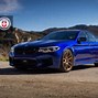 Image result for Blue BMW with Gold Wheels