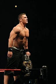 Image result for WWE John Cena Laying On Mat