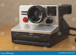 Image result for Polaroid Camera On the Table