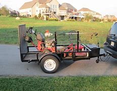Image result for Lawn Mower On 5 X 8 Trailer