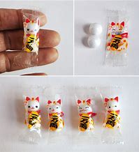 Image result for Cat Made From Wrapped Candy
