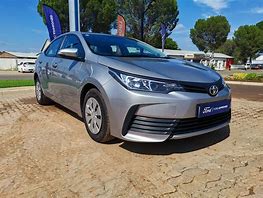 Image result for White Toyota Corolla Quest 2020