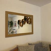 Image result for Marietta Floating 2 Layers Wall Mirror Grey Smoked Glass 80X40cm Black Frame