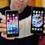 Image result for iPhone SE vs 6 in Hands