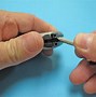 Image result for TV Remote Parts Puled Apart